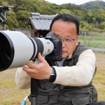 飛行犬を撮り続ける的場信幸さん=南あわじ市