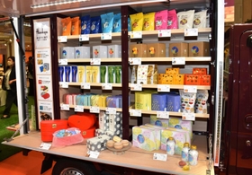 14日の事業開始を前に披露されたスイーツの移動販売車後部の陳列棚=12日午前、大阪市北区、阪急百貨店梅田本店