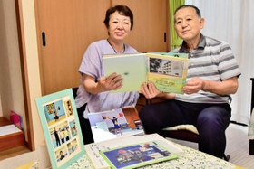 山本選手の卒業文集を手に思い出を語る父英雄さん(右)と母芳江さん=三木市内 山本選手の卒業文集を手に思い出を語る父英雄さん(右)と母芳江さん=三木市内