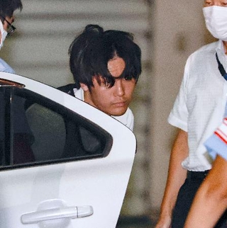 名古屋・南署に移送された石川勝也容疑者=1日午後10時32分