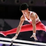 男子種目別平行棒決勝 演技する角皆友晴=ジャカルタ(共同)