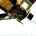 国際宇宙ステーションのロボットアームに捕捉された新型補給機「HTV-X」1号機(米航空宇宙局の中継から)