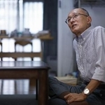 昨年11月、取材に応じる高羽悟さん=名古屋市