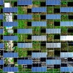市松模様を描くように規則正しく並んだ太陽光発電パネル(小型無人機より撮影)=宝塚市大原野
