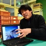 南極での経験を語る河合健次さん＝明石市和坂２