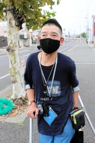 「障害者の声を国政に」と訴える福田剛さん＝明石市