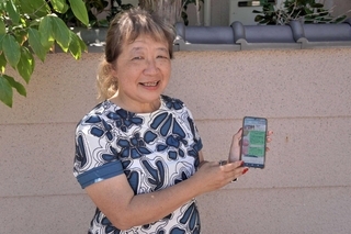 電子回覧板の意義を語る森川乃梨子さん＝明石市朝霧台