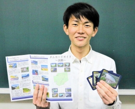 ダムの魅力を語る平敷和翔さん＝洲本高校