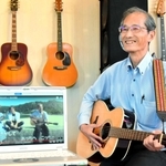 オリジナル曲のミュージックビデオをネット配信する柏木英樹さん＝淡路市志筑、タイヨー珈琲
