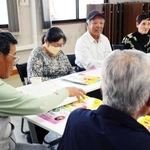 音楽イベント開催に向けて話し合う西淡ＣＭＣのメンバー＝南あわじ市松帆高屋
