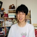 「体力をつけて、勉強を続けていく」と参考書を片手に話す藤田春満さん＝神戸市東灘区