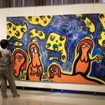 趙延修（チョ・ヨンス）さんが従軍慰安婦問題への憤りから描いた「償わなければならないこと」＝１１日午後、神戸市内（撮影・吉田敦史）