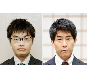 関航太郎天元（左）と伊田篤史九段