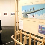 「ルパン三世ＰＡＲＴ２」の背景画などが並ぶ会場＝神戸ファッション美術館