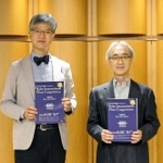 ８年ぶりに通常開催される神戸国際フルートコンクールをＰＲする運営委員長の神田寛明さん（左）と審査委員長の酒井秀明さん＝東京都内