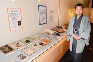 日本のダンスホールを40年以上研究した成果を企画展で披露する関西大学社会学部の永井良和教授＝大阪府吹田市、関西大学博物館