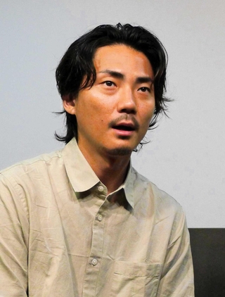 映画「桐島です」で主人公の指名手配犯、桐島聡を演じた毎熊克哉＝大阪市淀川区、シアターセブン