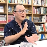 自身が取り組む「手話映画」について語る谷進一監督＝京都市内