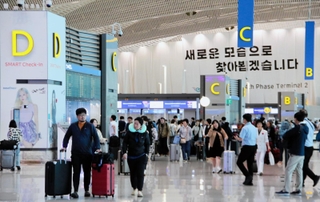 神戸空港と空路で結ばれることになった仁川国際空港。写真は大韓航空が使っている第２ターミナル＝５月、韓国・仁川広域市