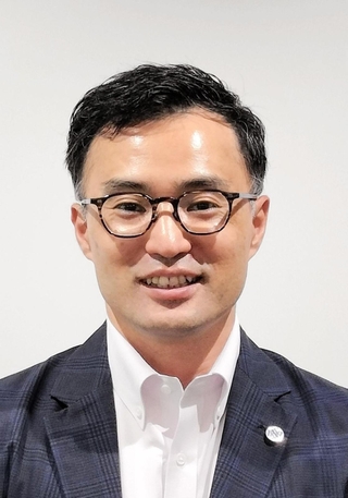 日本ビジネスデータープロセシングセンター副社長の池智太郎氏＝神戸市中央区伊藤町