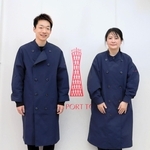 フェリシモがデザインした神戸ポートタワーのスタッフ制服。男女共通でダークネイビーが基調のジャケットコート＝神戸市中央区波止場町