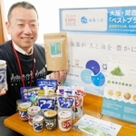 陸上養殖したアオサノリも使ったノリのつくだ煮を手にする田中智樹社長＝たつの市新宮町新宮
