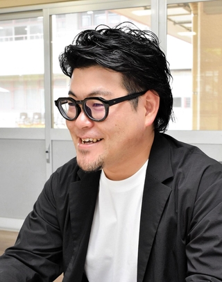 実証事業について説明するパーソルビジネスプロセスデザインの橋口真・執行役員事業開発本部長＝神戸市須磨区