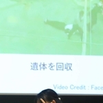 ミャンマー国内の現状を伝える映像を見て目頭を押さえるミャンマー人の女性＝尼崎市長洲中通１、市立小田南生涯学習プラザ