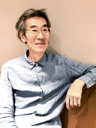 「何人だろうと人間が管理される時代になっている。我が事でなければ知らんぷりという空気も危ないと感じる」と話す金成日さん＝尼崎市内