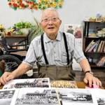 前田栄一さん。９６歳の今も生気みなぎる＝西宮市中前田町