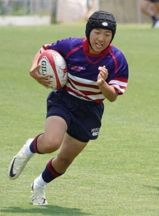 スピードを生かしてラグビー選手としても活躍する（提供）