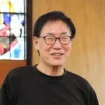 校名変更の背景について語る頌栄短大の柳本有二学長＝神戸市東灘区御影山手１