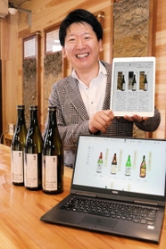 新設したオンラインショップをＰＲする本田商店専務取締役の本田龍祐さん＝姫路市網干区