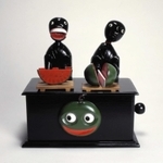 「神戸人形　西瓜（すいか）喰い」（県立歴史博物館提供）