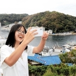 島の風景を満喫する「たまちゃん」ことグエン・ウエン・ゴックさん＝家島町宮