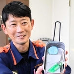 キャンプ用品を使った飯ごう炊さんの方法を広める姫路東消防署の消防司令補、藤井優行さん＝姫路東消防署