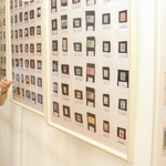 「琉球郵便」のコレクションを前に思いを語る田中孝史さん＝姫路市四郷町見野、見野の郷交流館