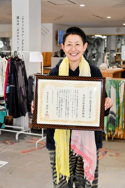 播州織産地の将来を語る玉木新雌社長＝西脇市比延町
