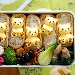 かわいいクマが並ぶ蒸し卵弁当（提供）
