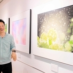 プロとして初の個展を大阪・梅田で開いた写真作家の玉田尚之さん＝大阪市北区