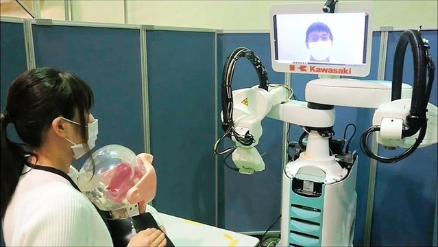 医師がロボットを遠隔操作し、ＰＣＲ検査を行うイメージ（メディカロイド提供）