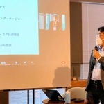 アフリカとの交流事業について語る神戸情報大学院大学の福岡賢二学長代理＝アンカー神戸