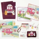 （右上から時計回りに）タオルハンカチ、アクリルキーホルダー、パスケース、がまぐち、缶入りメッセージカード、クリアファイルセットの各商品＝阪急電鉄提供