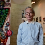 記念展の会場で基金の歩みを振り返る島田誠さん＝神戸市中央区（撮影・中西幸大）