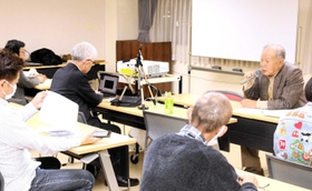 田中実さんと金田龍光さんの救出を訴えた集会＝県民会館