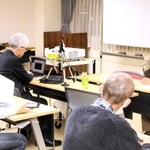 田中実さんと金田龍光さんの救出を訴えた集会＝県民会館