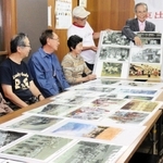 懐かしい街並みを撮影した写真を集める西出東出まちづくり協議会のメンバー＝東出町自治会館