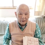 数字パズルに魅了され、自作を続ける北野良雄さん＝神戸市東灘区森北町４