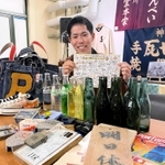 銭湯や炭酸飲料、野球カステラなどプライベートで神戸の産業や文化を深掘りしてきた神戸市職員の志方功一さん＝海外移住と文化の交流センター