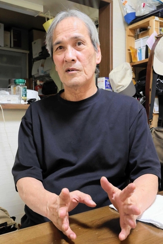 １４年の月日を振り返る堤敏さん＝神戸市北区